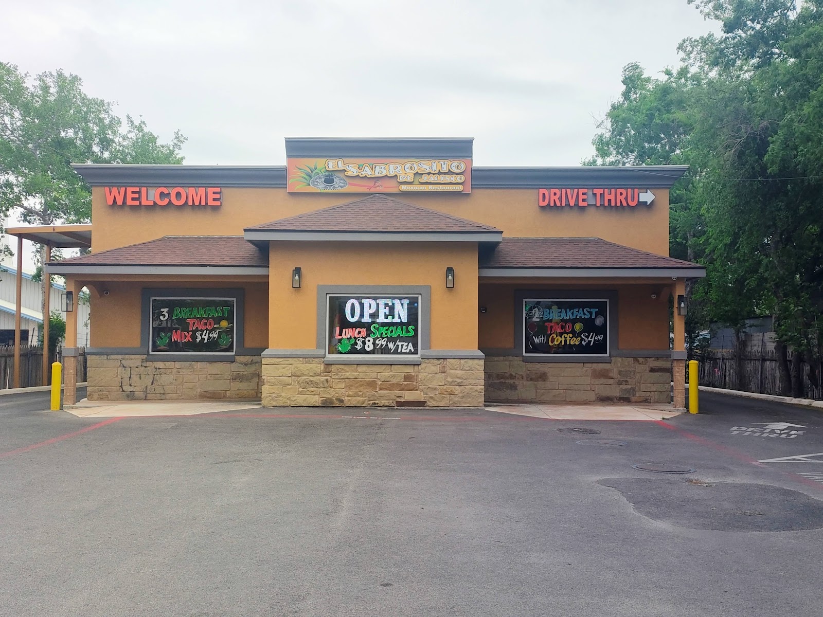 El Sabrosito de Jalisco restaurant exterior with welcome sign and drive-thru