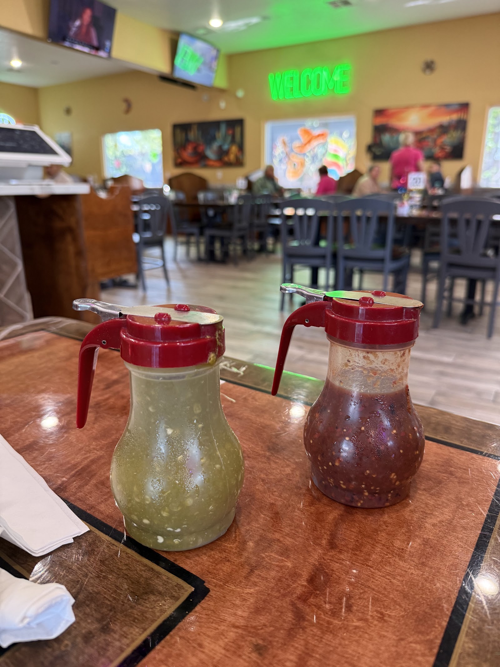 Fresh salsa verde and salsa roja on the dining room table